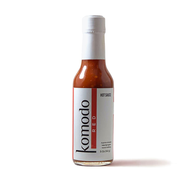 Komodo Red has a sweet and spicy flavor that packs a slow punch of heat. Of the two fresh and balanced Komodo Sauce flavors, Komodo Red is hotter than its black counterpart. Komodo Sauces contain a perfect balance of sweet and heat to pair with your favorite dishes like rice, wings, salsa, and pizza.