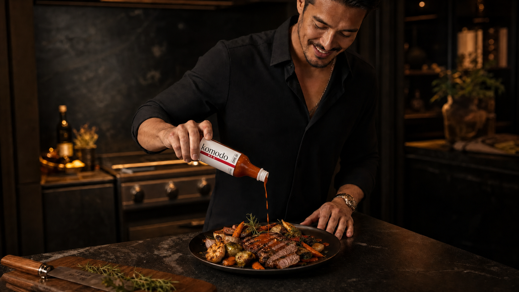 Chef cooking with Komodo small-batch Indonesian hot sauce — versatile artisanal chili sauce for any cuisine
