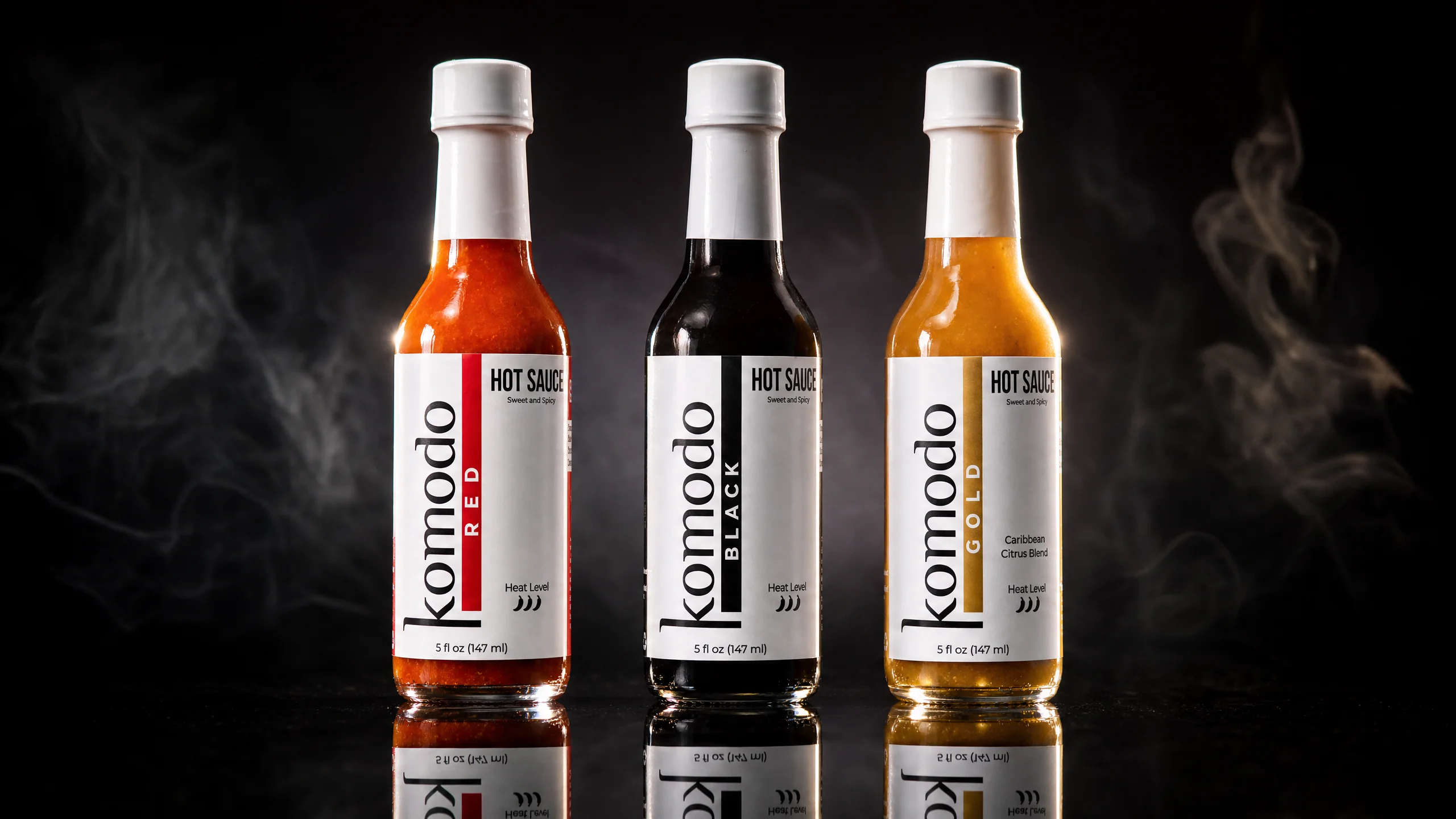 The Komodo System trio of small-batch Indonesian hot sauces — three artisanal chili sauce bottles for every flavor preference